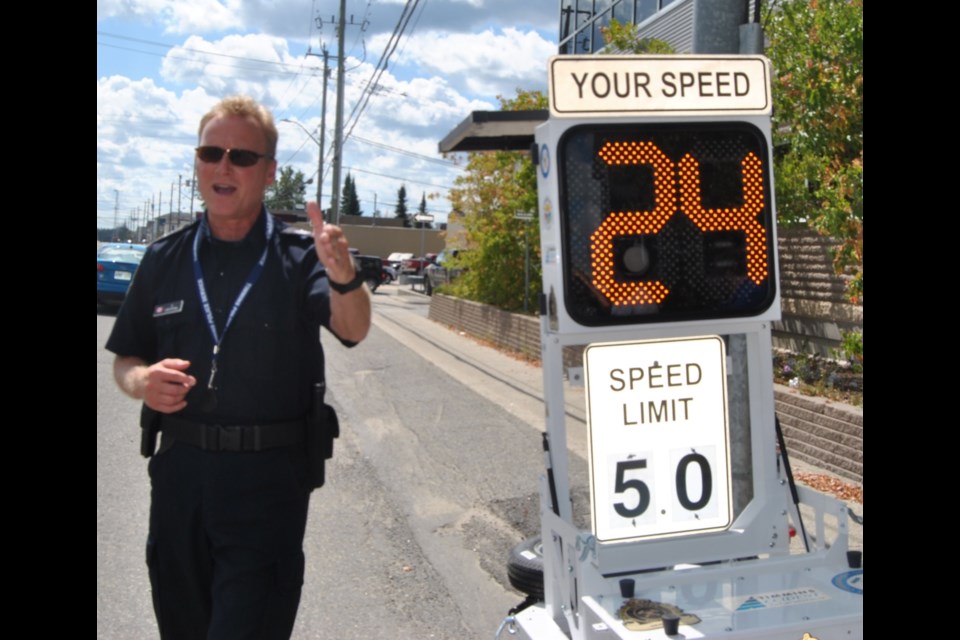 Sgt. Tom Chypyha from Timmins Police Traffic Unit explains the benefits of the speed radar equipment and how it can be used to reduce speed and also collect data that can used to make further improvements to road design changes or other changes to increase road safety. Photo: Frank Giorno, Timminstoday.com