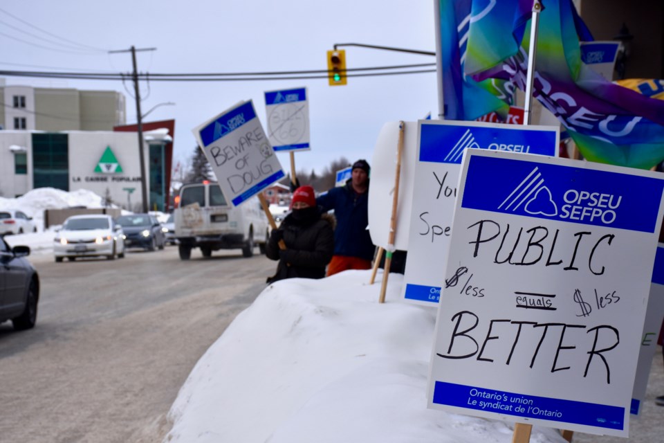 Dozens of people rallied outside the pre-budget hearings at the Senator Hotel in Timmins. Maija Hoggett/TimminsToday