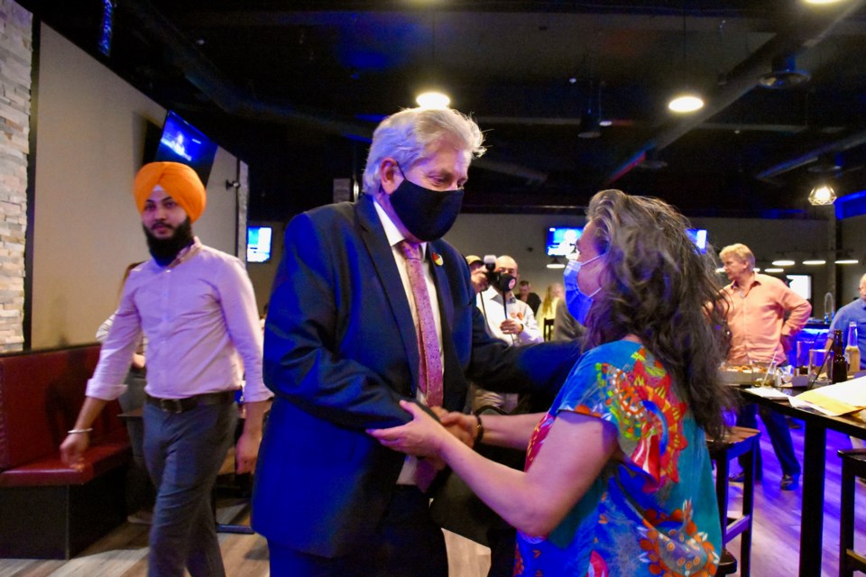 Charlie Angus celebrates his seventh-straight election win at The Surge in Timmins.