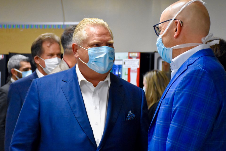 Premier Doug Ford and Dr. Doug Arnold at Timmins and District Hospital.