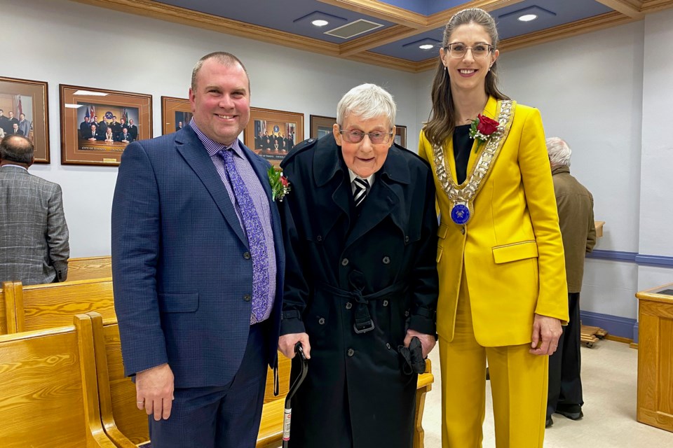 Former mayors Steve Black, left, and Vic Power and Timmins Mayor Michelle Boileau at the inaugural council meeting for this term in November 2022.