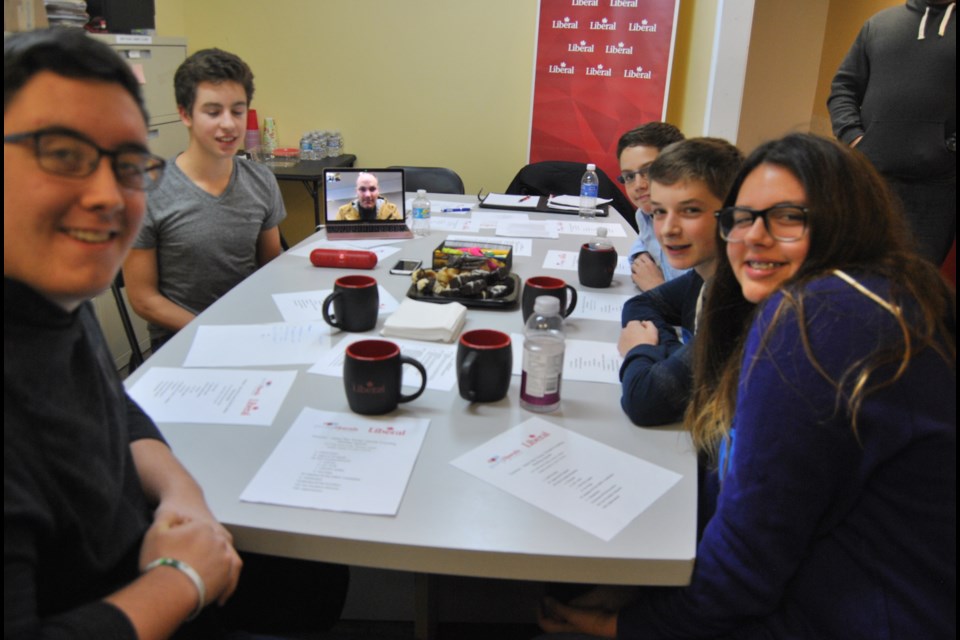 The Young Liberal Timmins-James Bay Riding Association executive meeting at Lever Law Offices in Timmins. Clockwise from bottom left: Justin Gadoury, Nicholas Harterre, president, Todd Lever, on laptop screen, Sam Harterre, Cole Chisholm and Michelle Curry, Treasurer. Frank Giorno for TimminsToday.