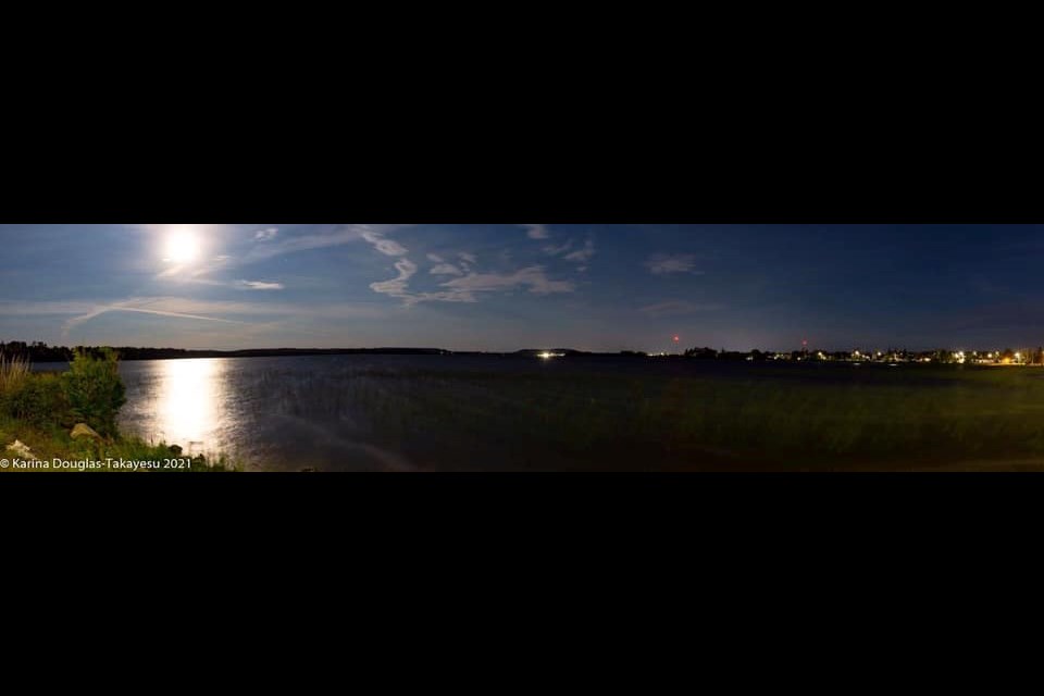 A six-frame panorama looking southwest across the lake from Bannerman Park after midnight on June 24th, 2021, the day before a full moon.