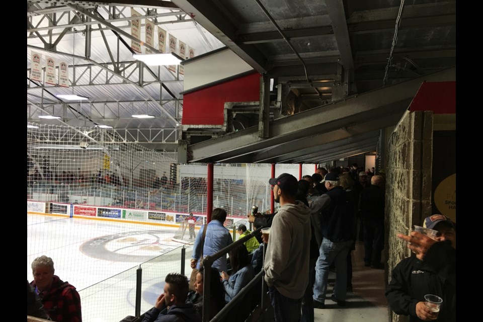 The licensed second level balcony at the McIntyre Arena is known as the 'Molson Canadian Hockey House' during Timmins Rock games, but its a local beer that is selling the most suds. Andrew Autio for TimminsToday