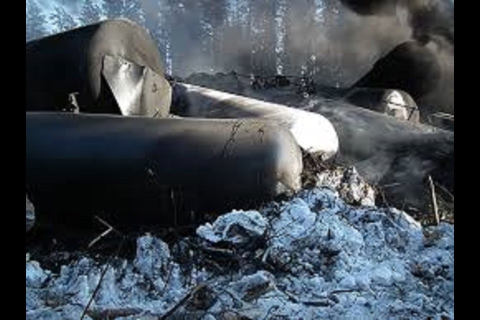 A CN rail train containing 100 tanker cars carrying crude petroleum derailed on February 14, 2015 causing oil to spill unto the frozen ground and emissions into the air caused by a fire that  flared up after the derailment. Photo by TSB.