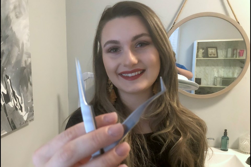 Michelle McKee has some of the steadiest hands in Timmins to successfully do her work as a lash technician. With tweezers, she adds synthetic eye lash extensions to clients, one lash at a time. Wayne Snider for TimminsToday