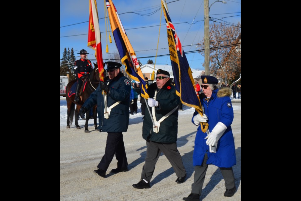 The colour party for Royal Canadian Legion Branch 287 get ready to lead the Remembrance Day march. Wayne Snider for TimminsToday