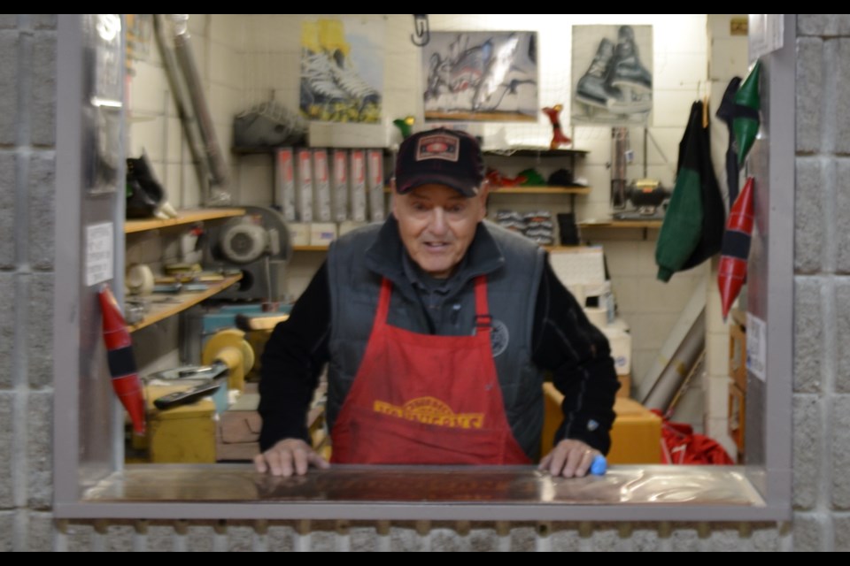 Dan “Tixie” Hannigan tends to the front counter at Hannigan Sports inside The McIntyre Arena. He has had his shop inside the arena for more than 20 years. Wayne Snider for TimminsToday