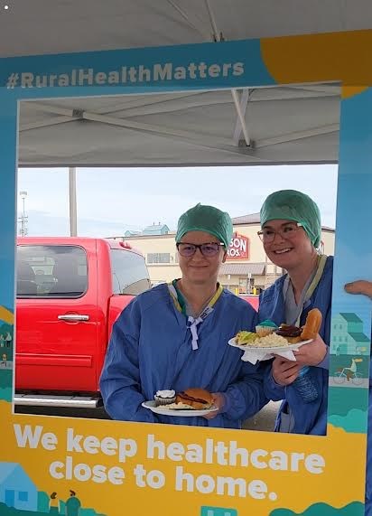 Operating Room nurses, Jenny Rentz and Stacy Warehime having their Appreciation BBQ lunch on May 29, 2024 and being thanked for all that they do.