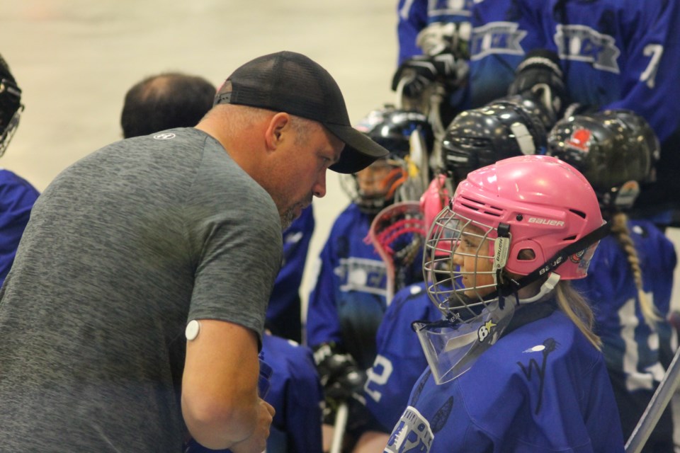 Goalie Brynlee Schram (left) and with assistant coach (right) Eli Yaworsky during half time of the Rock U-11 versus Rams U11-4 on May 24 at the Westlock Spirit Centre. 
