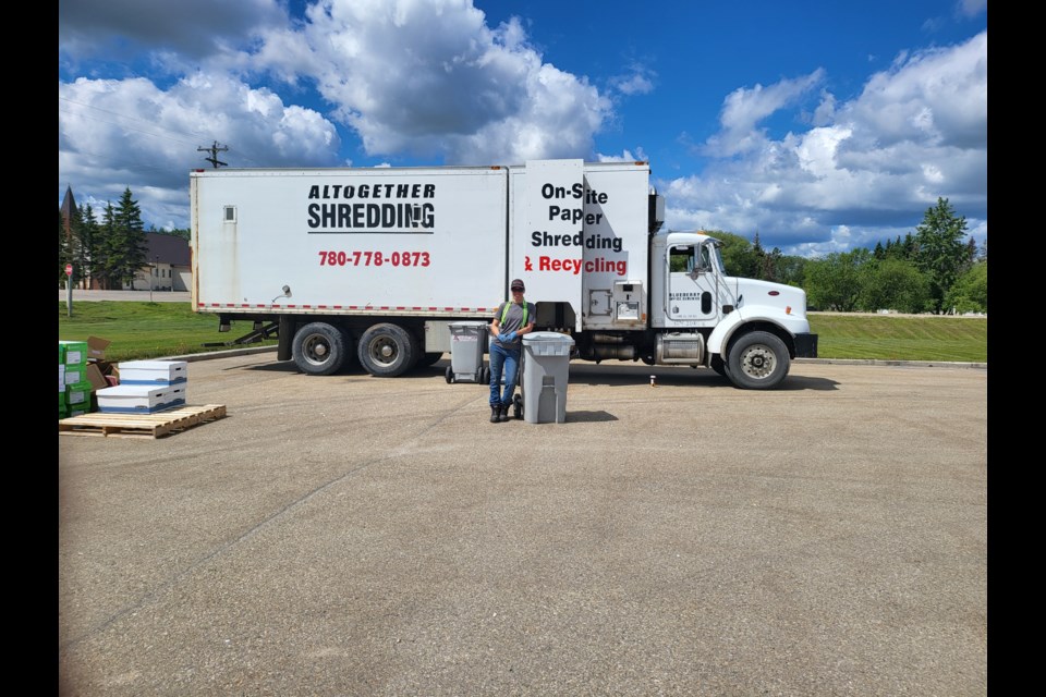 Kim Bennett, Altogether Shredding from Whitecourt, operated the shredding machine and processed the communities' shredding.