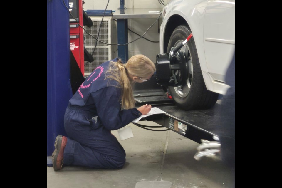 Savannah Greig from Barrhead Composite High School in the midst of mechanics competition. (Provided by Pembina School District Staff)