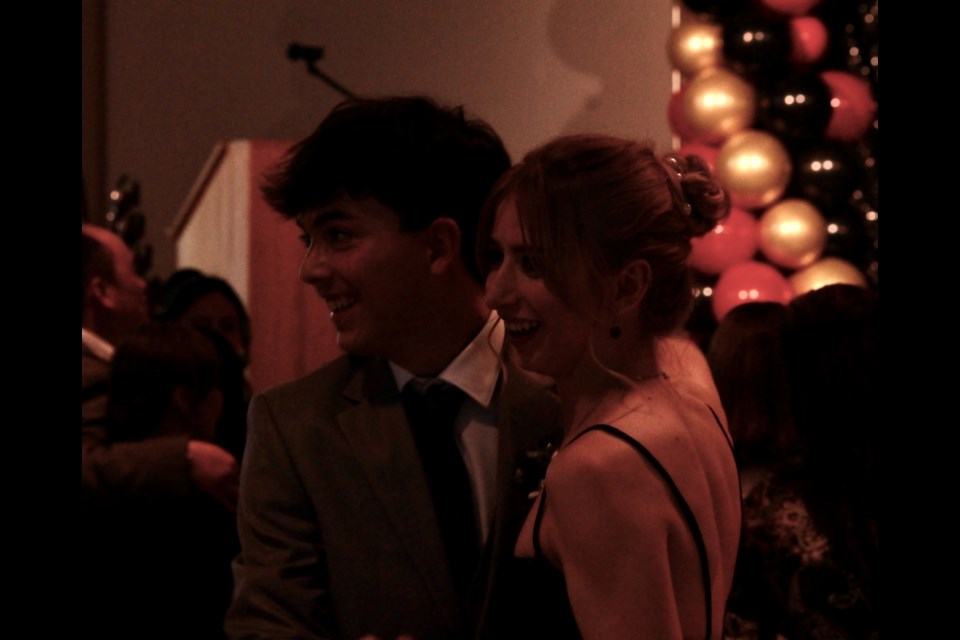 Kameron Campbell (left) and Jewel Skjersven (right) enjoy a nice dance at the end of the night. 