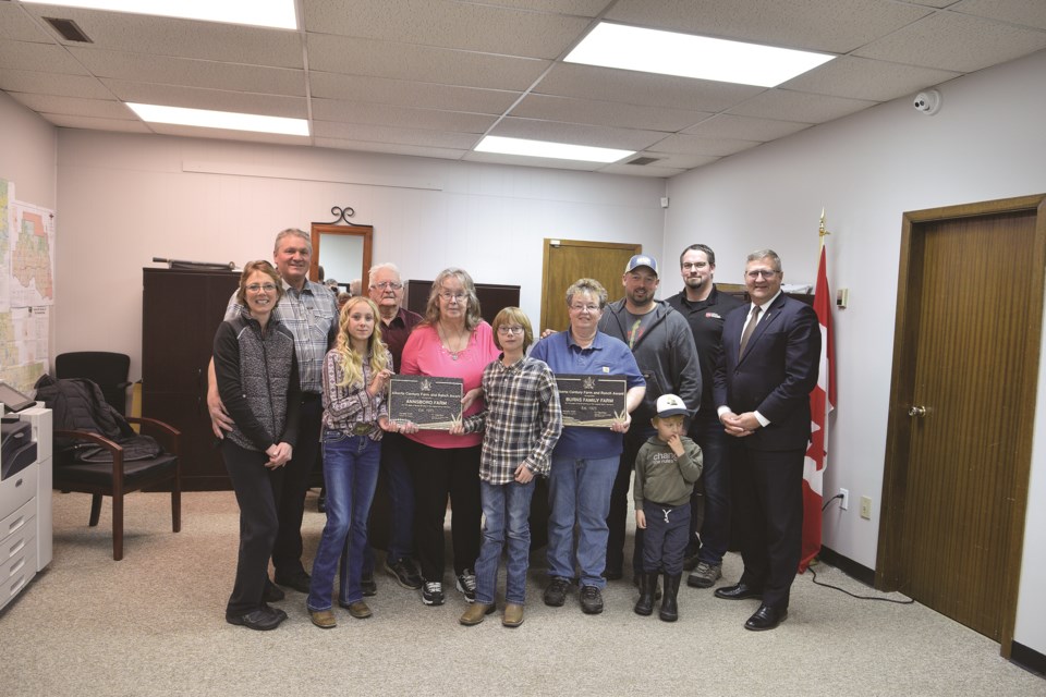 Pictured from left: Rhonda Esau, Kevin Meakin, Elise Meakin, Syd Meakin, Anna Meakin, Jordan Meakin, Lois Schmidt, Steven Schmidt, David Schmidt, little guy in front Jackson Schmidt and Athabasca-Barrhead-Westlock MLA Glenn van Dijken.