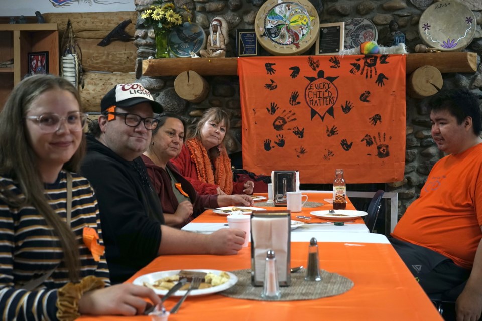 (L-R) Taylor Garratt, Daniel Stengrim, Allison Prouse, Janice Trudeau and Raine Duperron enjoy the pancake breakfast at the Athabasca Native Friendship Centre Sept. 29.                                 