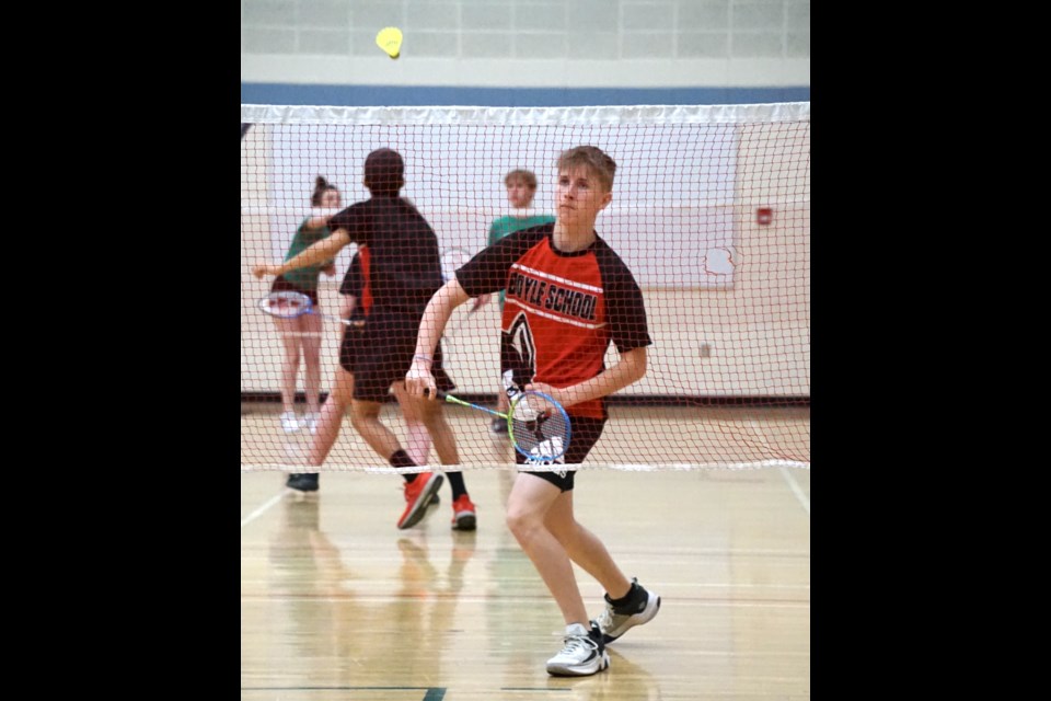 Boyle School student athlete Aiden Noyes prepares to return a birdie during the April 29 Sr. High Badminton Regionals hosted in Boyle.                         