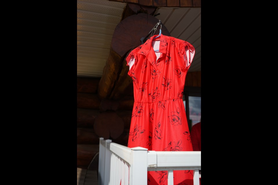 Vibrant red dresses of different shades, styles, and sizes could be seen hanging both inside and outside the Athabasca Native Friendship Centre May 3 in honour of Red Dress Day on May 5. The day is meant to honour and recognize all of the Missing and Murdered Indigenous Women and Two Spirit People (MMIWG2S) across the country.                                