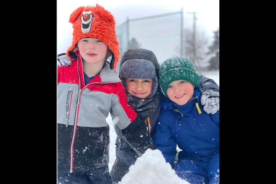 Fort Assiniboine School students Nicholas Jacobson, Jan Dorenbos, Samuel Kostelyk were having a fantastic time playing outside. Photo supplied.