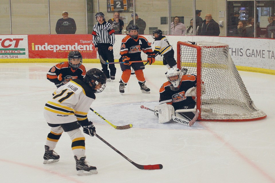 The Athabasca U11-2 Hawks finished off the round robin of their Tier 5 playoffs Sunday with a 6-3 win over the CR Knights. Pictured, Carter Haub spent a lot of time near the net but couldn’t put this opportunity passed the Knights’ goalie.