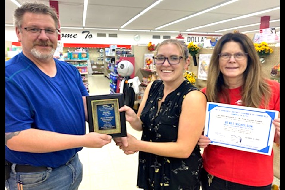 Chamber director Todd Dutchak awarded the Manager of the Year Award to Renee Nicholson at the Great Canadian Dollar Store Wednesday morning. L-R: Dutchak, Nicholson and Tracey Nicholson.