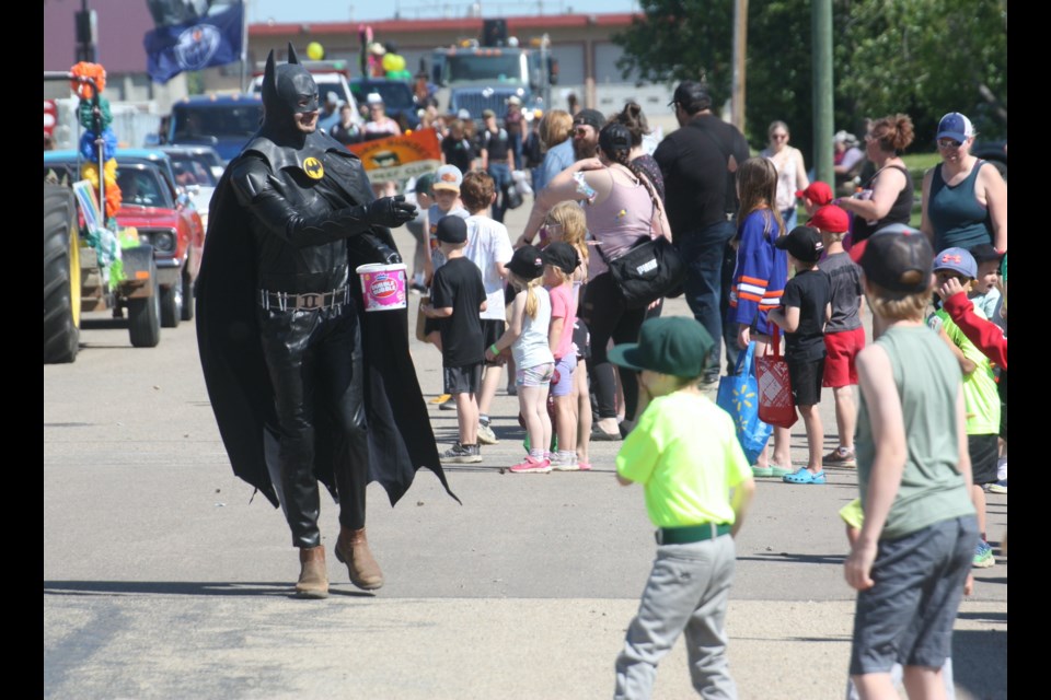 The infamous Batman took a break from crimefighting to pass out candy to children during the parade.