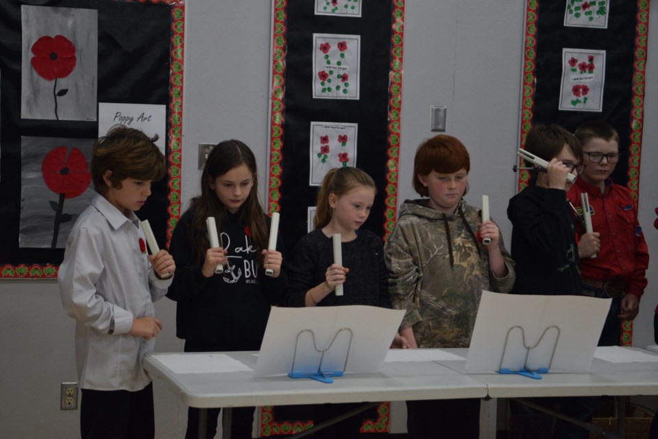 The Dunstable Grade 5-6 handbell choir performs Amazing Grace. Pictured from left: Ezra Stennes, Kaitlyn Teha, Alana LaRocque, Eidean Heinz, Emmit Henkelman and Rope Potts.