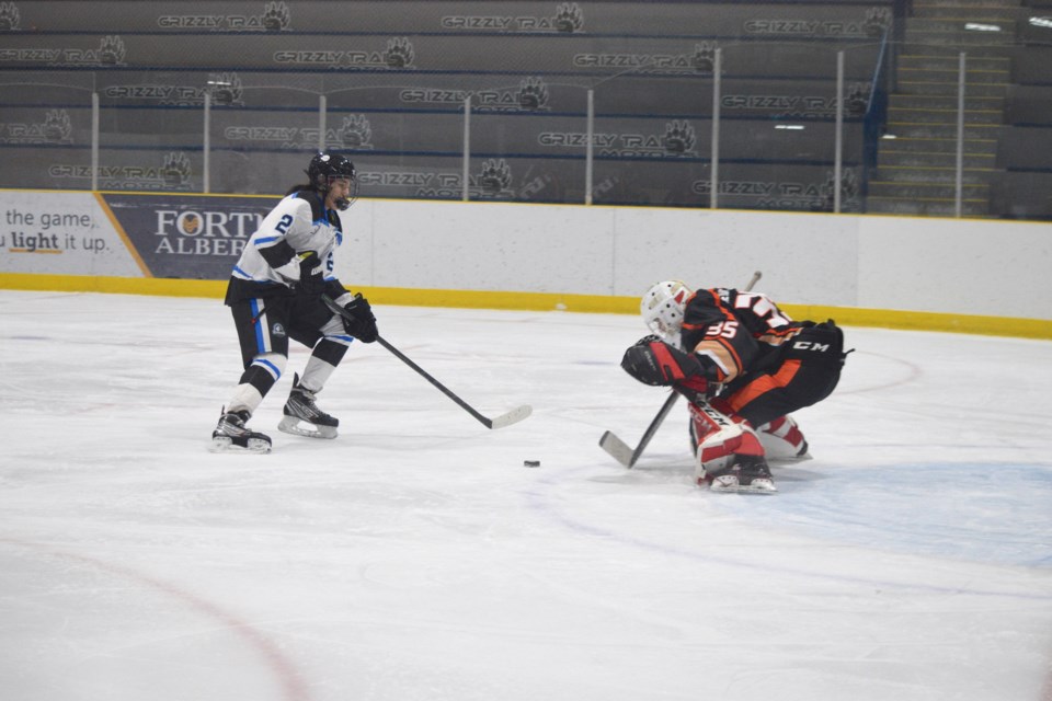 Unfortunately, Andy Carifelle of the Barrhead Bombers could not convert this second-period breakaway into a goal.