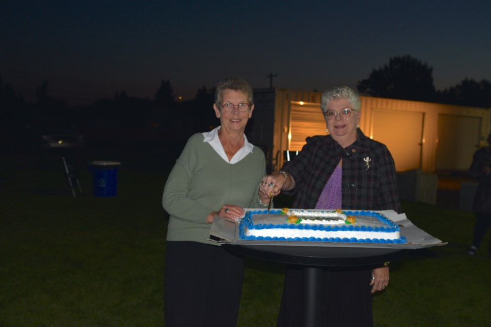 BHSSA's longest-serving employee, Anna Swan, who has been with the organization since the 1970s and Trudy Gammel, a board member for over 20 years, cut the ceremonial cake.
