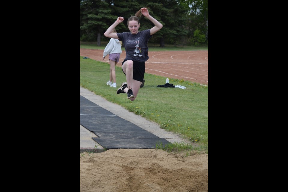Annabelle Kepler getting some air in the triple jump.