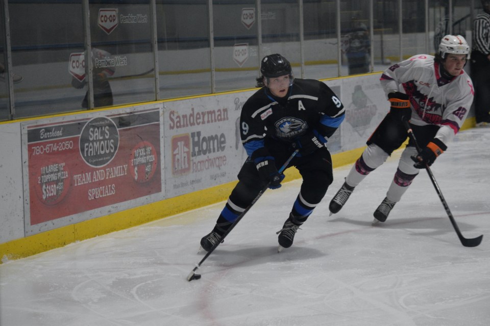 Barrhead forward Christopher Vinck looks for a teammate to pass to from deep inside the Hinton Zone.