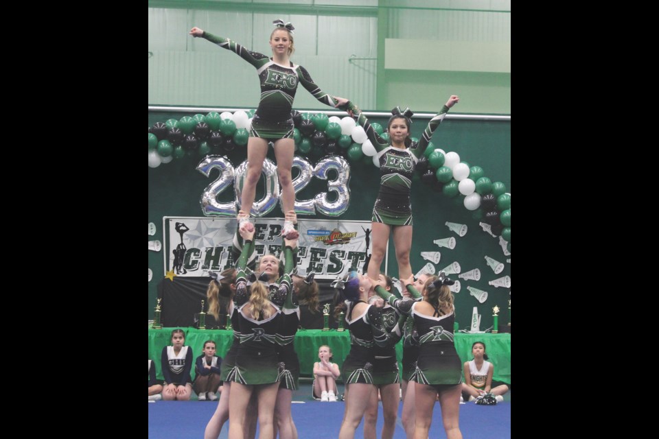 The Athabasca Regional Multiplex was filled to capacity Feb. 4 for the return of Cheerfest. The event brought 14 cheer teams from around Alberta, including Edwin Parr, Landing Trail and Whispering Hills Primary. With a little help from their EPC teammates, Jamie Kusch (left) and Rianne Bisnar, stand atop and strike a pose.