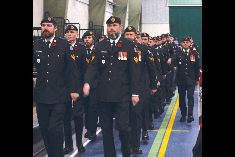 Soldiers from 1 Combat
Engineer Regiment, based in Edmonton, marched into the Athabasca Regional Multiplex as
part of the Colour Guard for the service, a group that also included members of the RCMP, 230
Royal Canadian Air Cadet Squadron, Athabasca Royal Canadian Legion #103 and others.