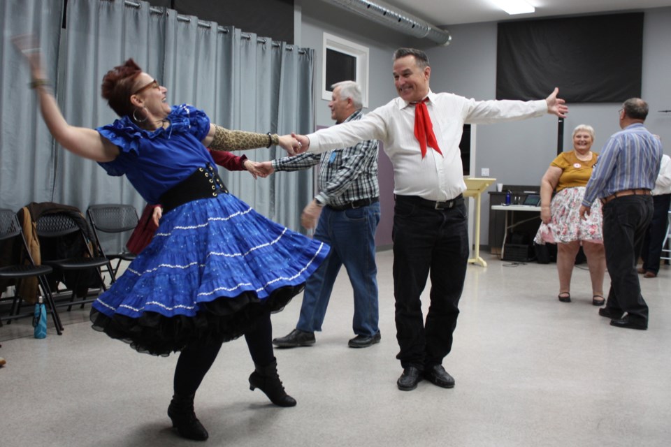 Susan Galloway and Bruno Wiskel put a little flourish at the end of square dancing at Turnabout Avenue Place in Athabasca Jan. 3.
Heather Stocking/AA