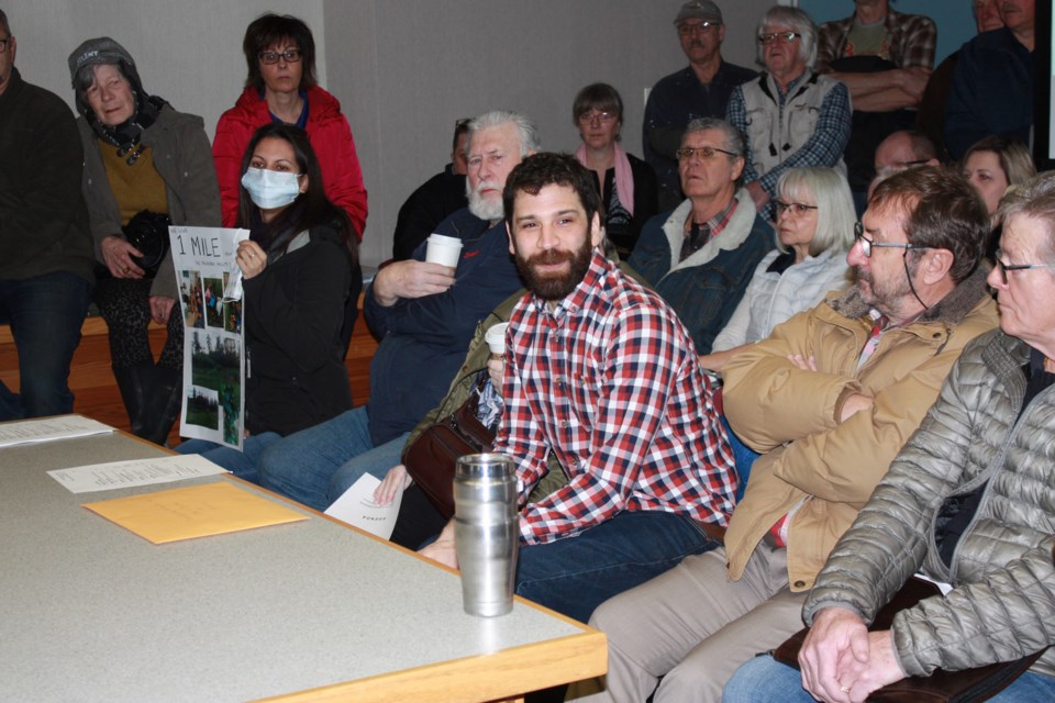 Tom Habib (centre) spoke to the Athabasca Municipal Development Committee on Jan. 28 about concerns with the proposed sand mining operation. Habib was joined by about 50 other Town and County residents.
Heather Stocking/AA