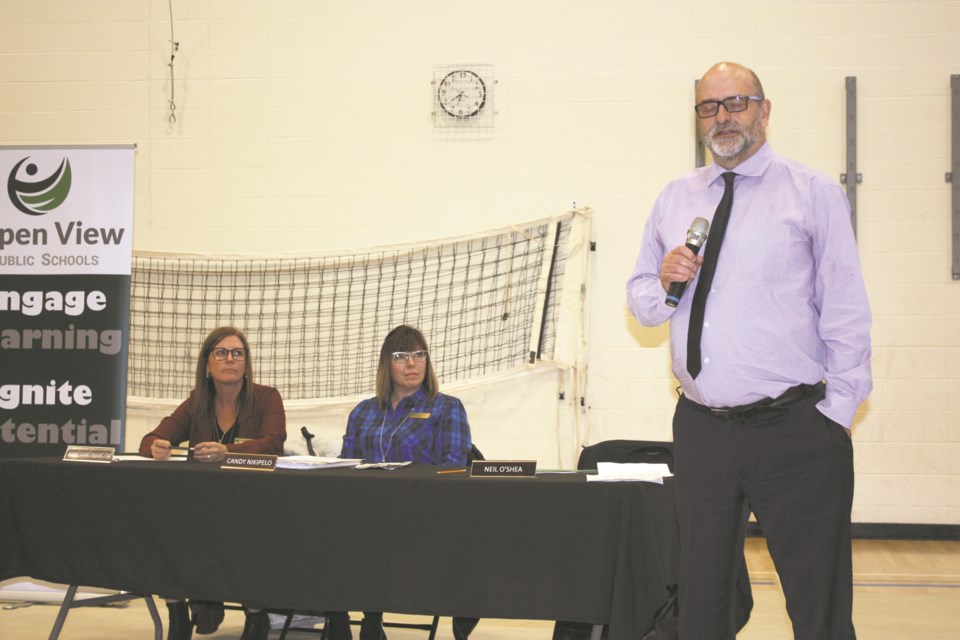 Aspen View Public School trustee Anne Karczmarczyk and chair Candy Nikipelo listen to Supt. Neil O'Shea speak at a Feb. 20 public meeting regarding a proposed Catholic school.
Heather Stocking/AA