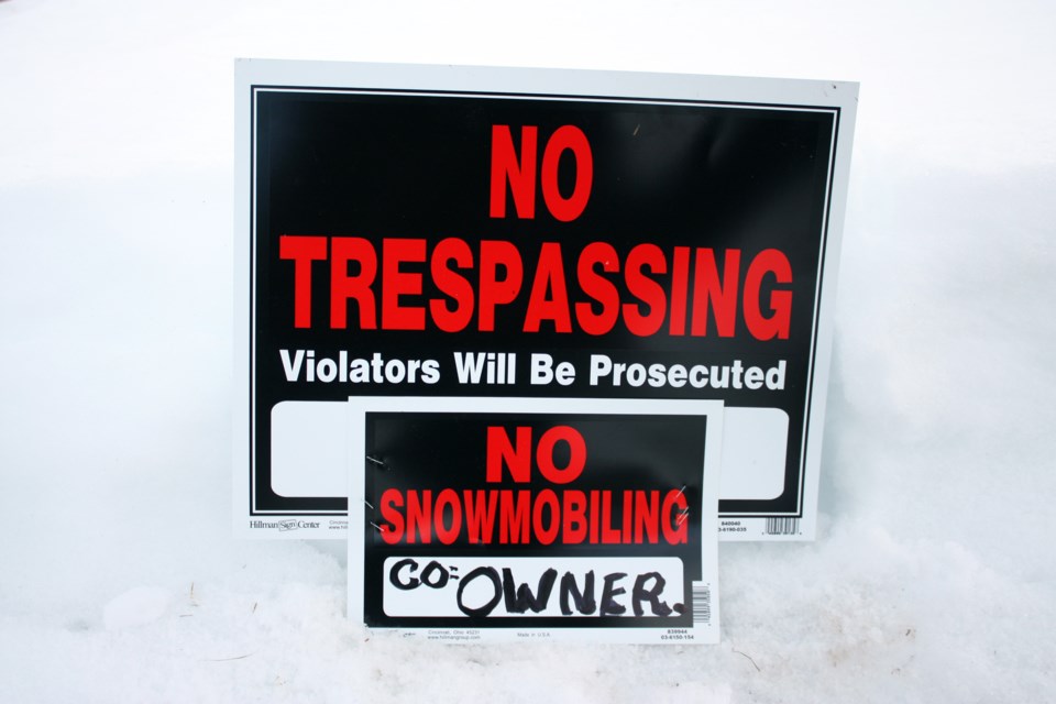 Pat Strong has made new signs to try and deter snowmobilers from trespassing on her property.
Photos by Heather Stocking/AA