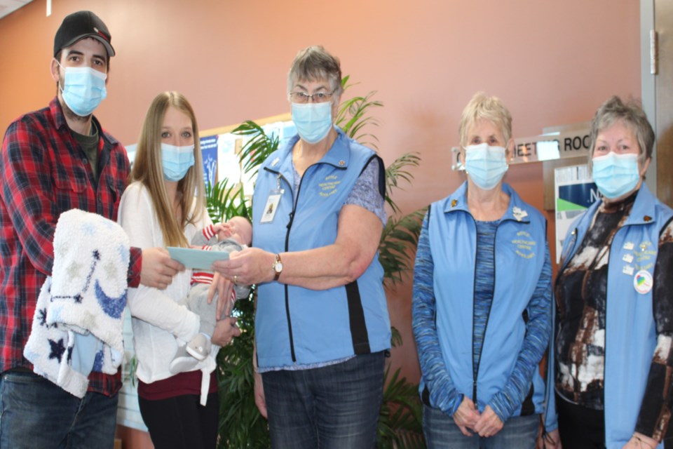 Jaxston Riley-Blundon made local history as the first baby born at the Boyle Healthcare Centre in 22 years. 

(L-R) Steve Blundon, Amanda Riley holding Jaxston, Boyle Healthcare Centre Ladies Auxiliary president Belinda Hague, Claudette Dornan and Alexandra Kuzyk. 