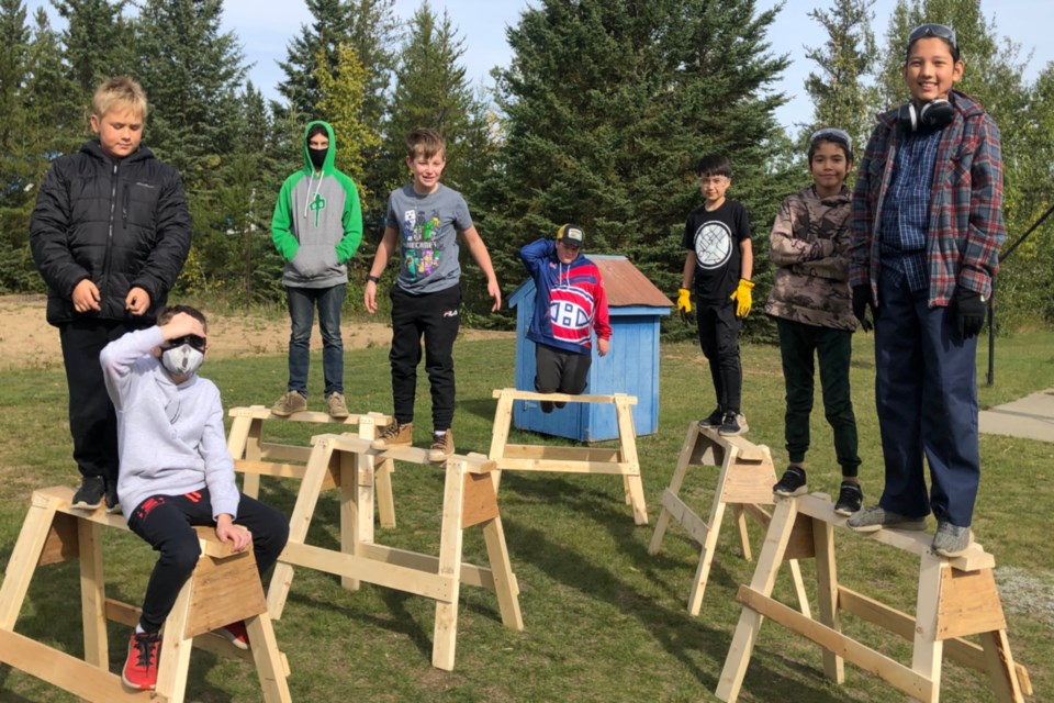 The first project in woodworking class as part of the new STEAM Academy at Rochester School was to build sawhorses and then of course, test them out. The option is one of many being offered by the rural school to get students interested in science, technology, engineering, arts and mathematics, or STEAM.
(L-R): Will Minsky, Kyle Speers, William Gilbert, Brody Anderson, Ethan Oko, Konrad Riekenberg, Sage Noskiye, Ethan Cardinal