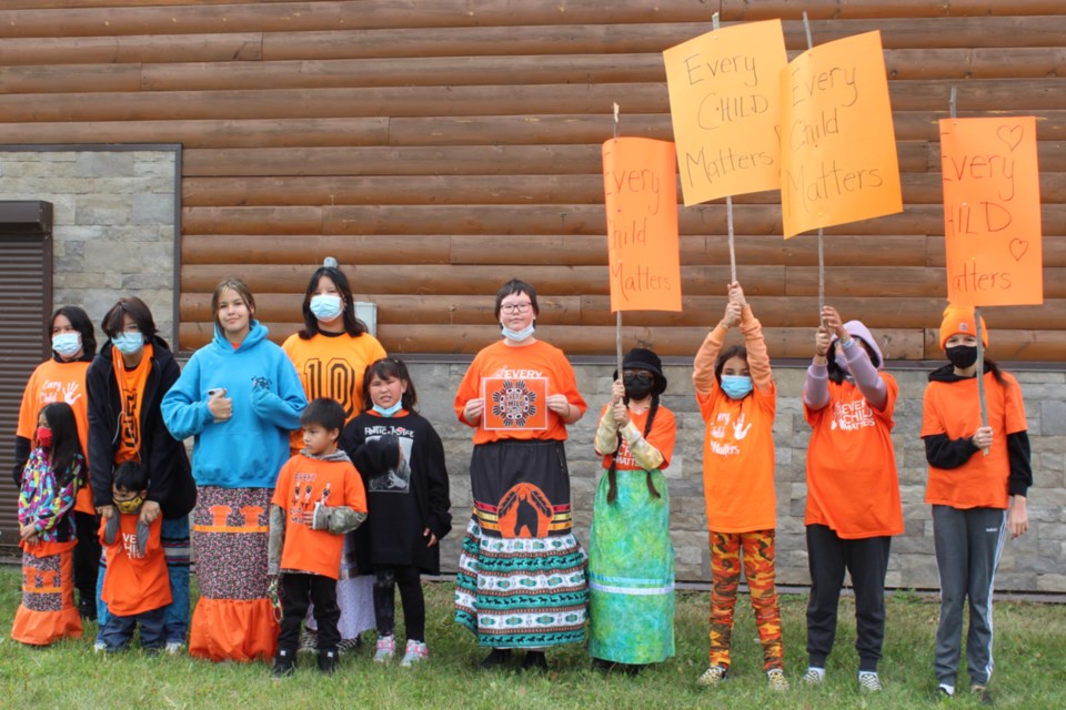 Some of the students from Calling Lake school participated in a second walk to remember children lost to residential schools Sept. 30, a day after the school-organized walk was ruined by a man yelling racial comments and insults at the teachers and youth.