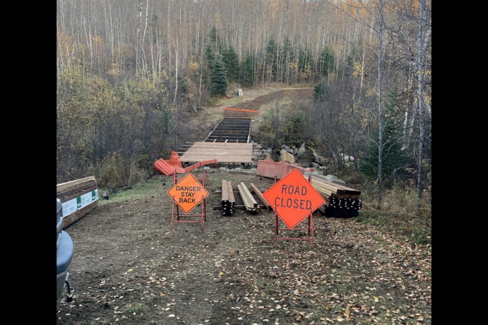 Fred Minville posted this photo on social media Oct. 9 asking for more volunteers to come to help replace the middle bridge on the Muskeg Creek Trail. Since then, more work has been done and it is ready to go.