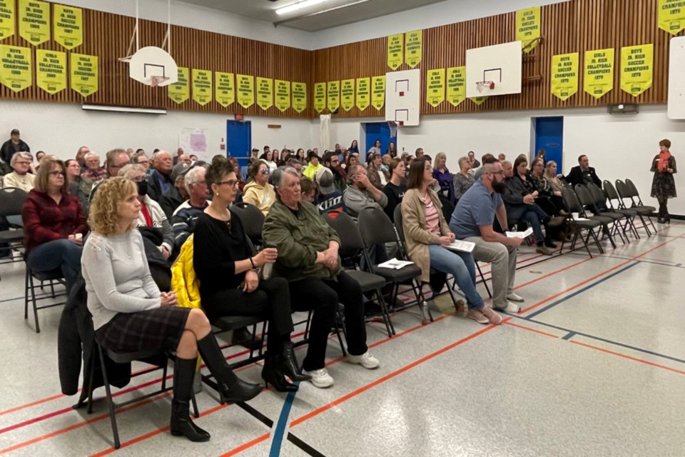 Rochester residents of all ages filled the Rochester School gym to hear about the proposed closure of the hamlet's school. At least two different people without children stood up to say they chose to move there specifically because they planned to have children and preferred the small class sizes.