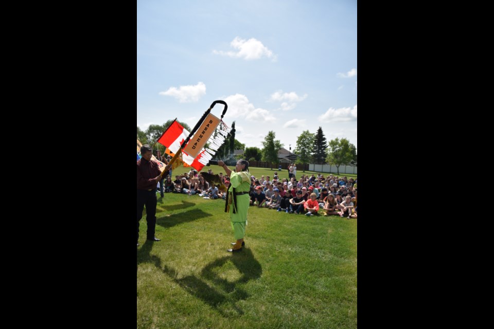 Robin Berard performing a smudging ceremony at National Indigenous Peoples Day June 20 at Cecile Martin Park.