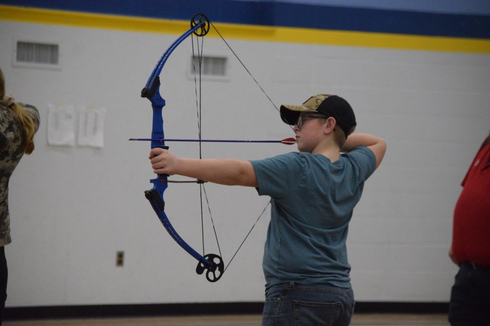 Barrhead Elementary School student Liam Sturworld about to launch his arrow during a Jan. 22 practice session at BCHS' centre gymnasium.
