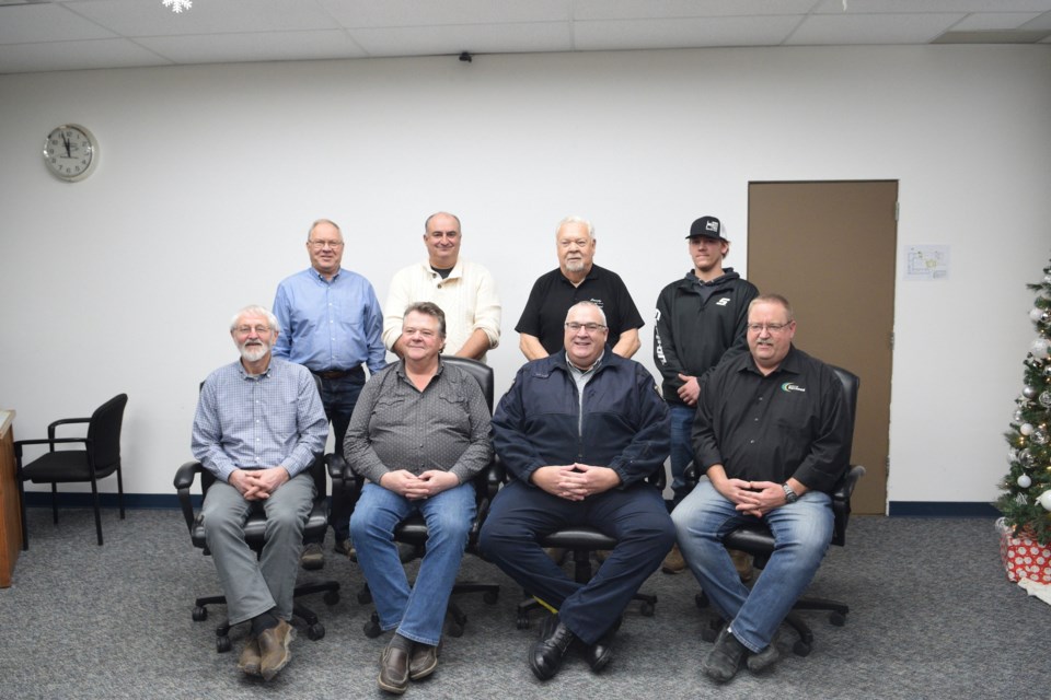 Barrhead RCMP Detachment commander Sgt. Bob Dodds visits the County of Barrhead council for the last time on Dec. 19. 
Pictured back row from left: Coun. Ron Kleinfeldt, Coun. Paul Properzi, Coun. Bill Lane and Coun. Jared Stoik. Front row from left: Coun. Walter Preugschas, reeve Doug Drozd, Sgt. Bob Dodds and deputy reeve Marvin Schatz.