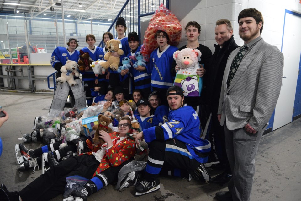 The Barrhead Bombers pose with some of the stuffies they collected after the game on Teddy Bear Toss Night on Dec. 15.