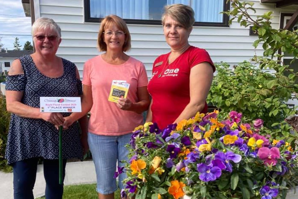 The first prize winner of this year’s Boyle Betterment Committee Floral Contest is Mariette Nayowski (centre), who received her $100 gift certificate, courtesy of CIBC, from committee members Aranka Kristensen and Lindy Mills Aug. 21.

Submitted