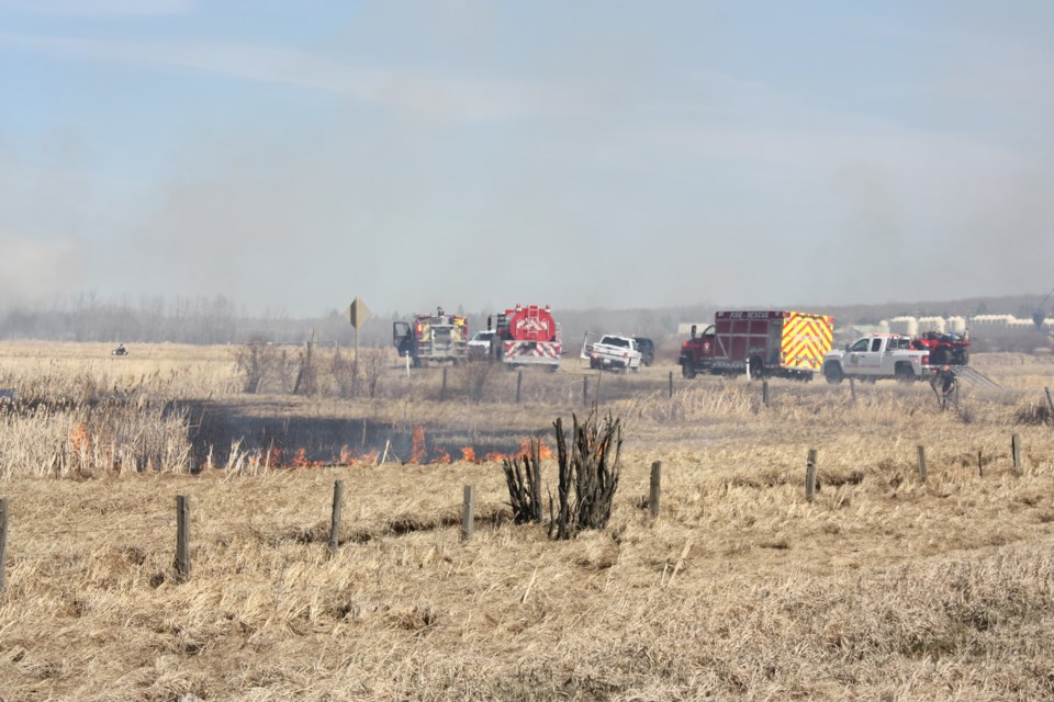 Crews from the Village of Boyle Fire Department called in reinforcements from Colinton to battle a large grass fire just north of the village April 29. Winds from the west spread the flames fast as much of the field was singed, but firefighters were able to get it under control relatively quickly. An unused shed and old corral were the only structures lost in the fire.