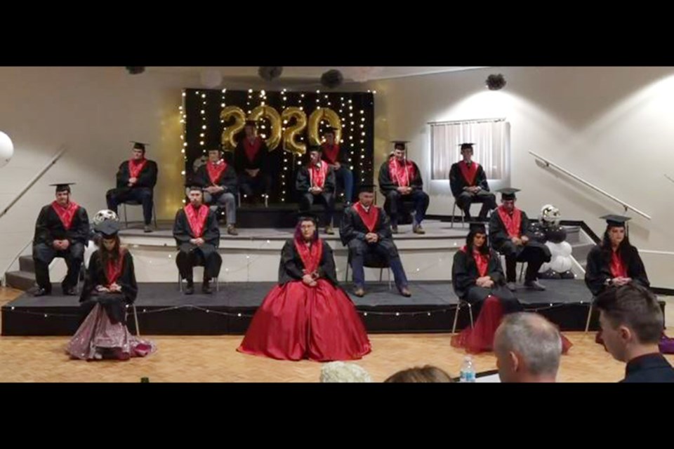 The 2020 graduates of Boyle School were able to have a commencement ceremony after all Sept. 5, after possibly having to forego the tradition because of the COVID-19 pandemic. Pictured is the Boyle School Class of 2020, via the Boyle School Facebook feed, on stage at the Boyle Community Hall, practicing their physical distancing.

