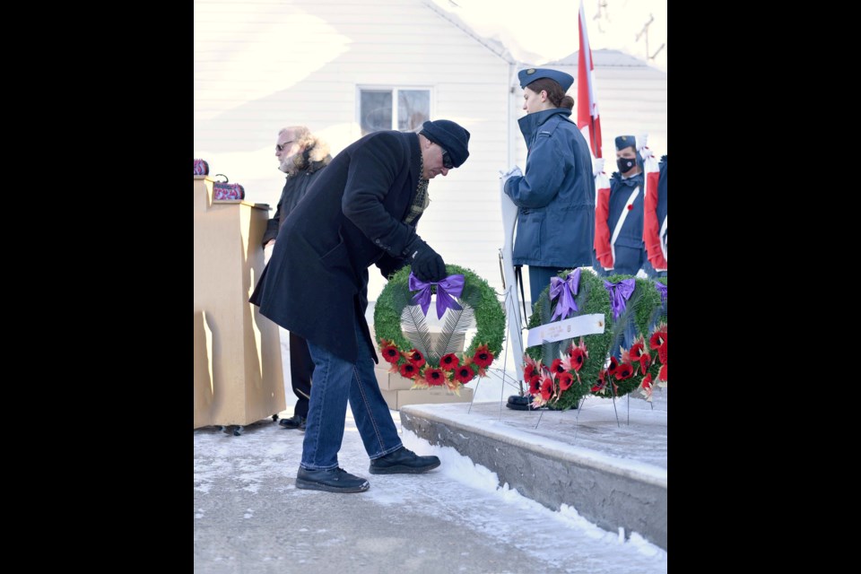 Boyle and area residents
gathered with honoured guests
at the Boyle Legion Nov. 11, just
before the eleventh hour, to commemorate the fallen and those who serve or served as protectors of Canada at home and abroad. Led by Boyle Royal Canadian Legion #163 president Bruce Lowden, those in attendance heard from veterans and their family members, dignitaries and others; stood in
silence for two minutes; heard
“Last Post” and “Reveille”; and
saw many wreaths laid in tribute. (Pictured) Canadian Army
veteran Dean Poffley gave a passionate speech about love
of country before laying a
wreath. 