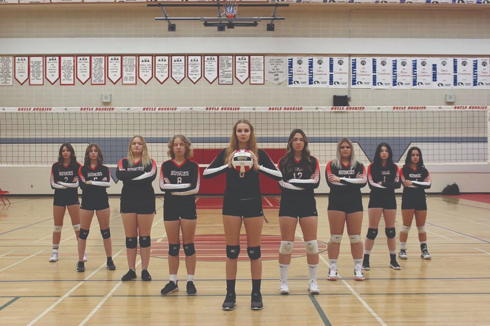 Boyle School’s Sr. Girls Volleyball team put together quite a year which culminated in a silver medal at the 1A North Central Zones in Redwater Nov.
18-19, falling only to Warburg. Coaches Elise Murphy and Shayla Derko praised the group for their commitment, hard work and resiliency. Pictured
(L-R) before their first game at the zones tournament, Cheyenne Belhumeur, Tianna Brockbank, Makayla Krawchuk, Machenna Burt, Paige Bechthold,
Jenna Ewanciw, Jessy Maurice and Brynn Brassard.